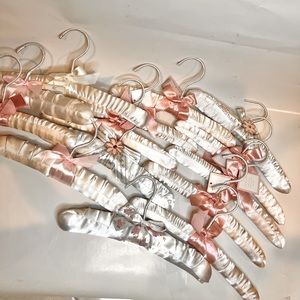 14 baby satin baby boutique hangers NEW with tags and bows.